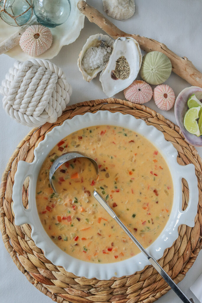 bird's eye view of serving bowl of chowder with nautical decorations