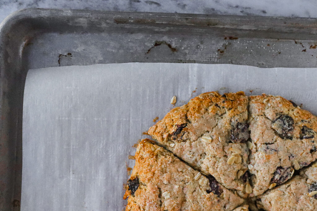Cherry studded oatmeal scones cut into six slices