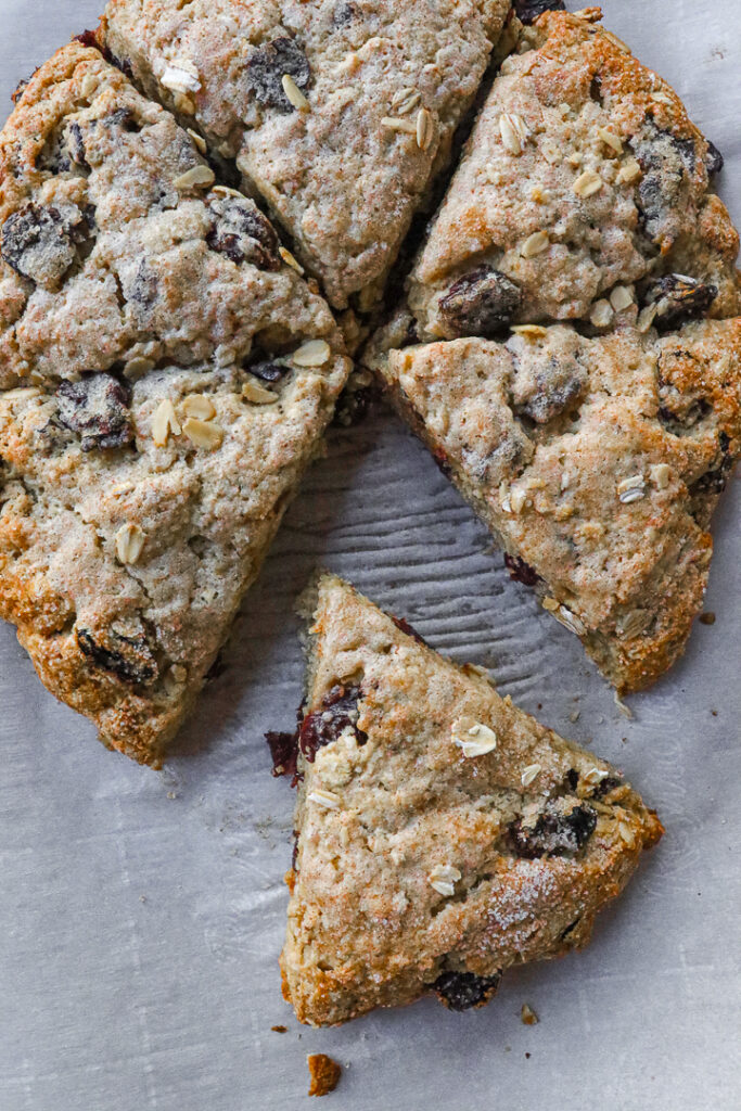 Cherry studded oatmeal scones cut into six slices