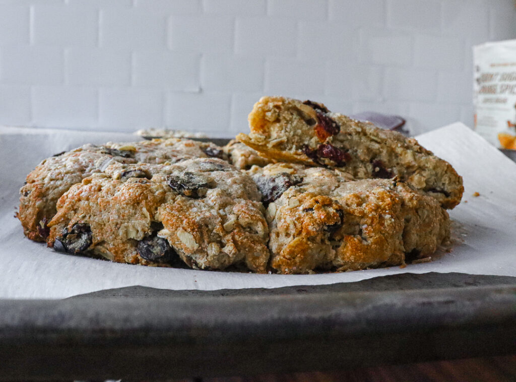 Cherry studded oatmeal scones cut into six slices
