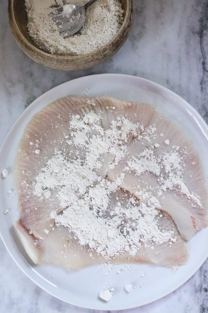 raw skate with flour sprinkled over it