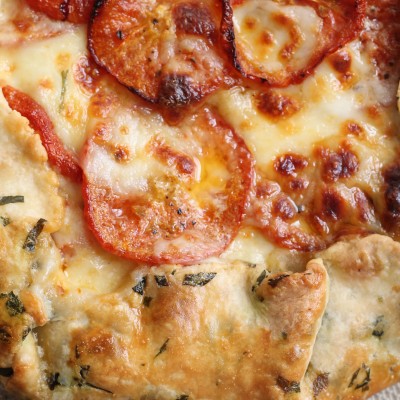 Savory Tomato Mozarella Galette with Basil Flecked Dough recipe